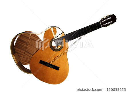 A broken smashed acousitic guitar music instrument on white background A broken smashed acousitic guitar music instrument on white background 130853653