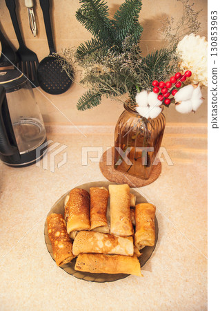 Cooking homemade Russian pancakes Bliny with meat on Shrovetide - Maslenitsa. Cooking at home Cooking homemade Russian pancakes Bliny with meat on Shrovetide - Maslenitsa. Cooking at home 130853963