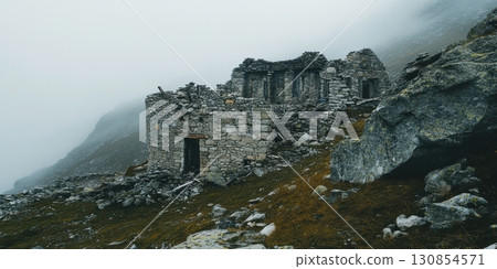 Ruined Stone House Mountaintop Foggy Landscape Dramatic Grey old rock hill mist view wild wreck 130854571