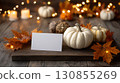 White blank paper with an autumn leaves and pumpkin. 130855269
