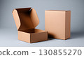 A half-opened paper box an on a Grey background.  130855270