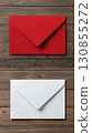 A mockup of two paper envelopes.  130855272