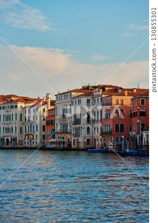 Venetian buildings along Grand Canal at sunset 130855301
