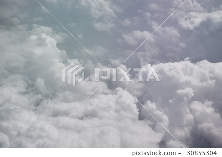 Fluffy white clouds, aerial view 130855304
