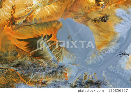 Patterns of acid mine drainage in decanting lake, nature pollution, aerial view Patterns of acid mine drainage in decanting lake, nature pollution, aerial view 130856337