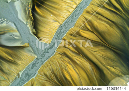 Patterns of acid mine drainage in decanting lake, nature pollution, aerial view 130856344