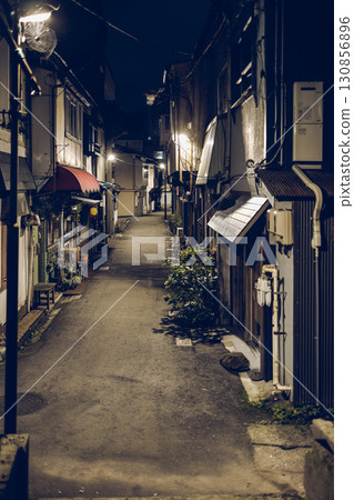 Quiet night alley in Kanazawa with dim light vintage film style traditional houses Quiet night alley in Kanazawa with dim light vintage film style traditional houses 130856896