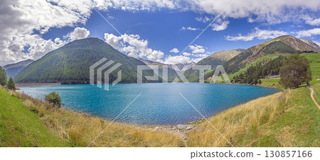 Panorama of Vernagt reservoir with alpine mountains South Tyrol Italy Panorama of Vernagt reservoir with alpine mountains South Tyrol Italy 130857166