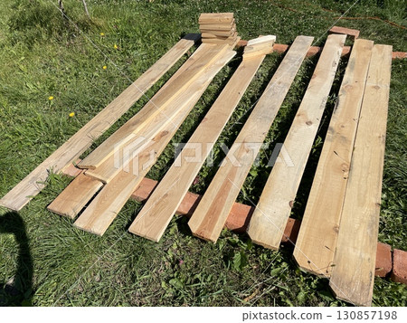 Pine lumber wooden boards for construction Pine lumber wooden boards for construction 130857198