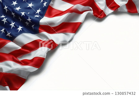 American Flag Waving Gracefully Under Bright Sunlight in a Clear Blue Sky. 130857432