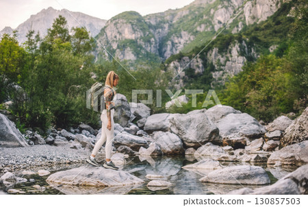 Woman Traveler Hiking Alone in Albanian Alps 130857503