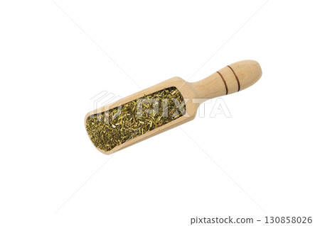 passion flower herb in latin - passiflora incarnata in wooden scoop isolated on white background. Medicinal herb. 130858026
