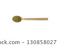 passion flower herb in latin - passiflora incarnata on wooden spoon isolated on white background.  Herbs. Alternative medicine. 130858027