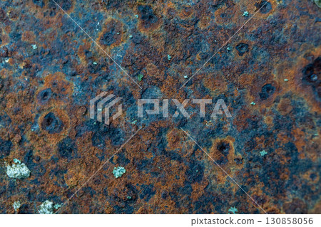 Close-up of rusty metal surface with corrosion patterns 130858056