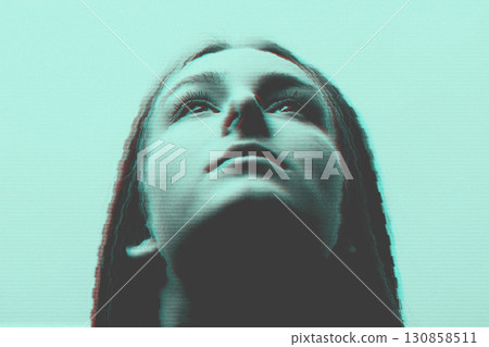 Woman looking up portrait in glitch effect style Woman looking up portrait in glitch effect style 130858511