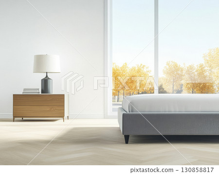 Modern bedroom with minimalist design and autumn view through large windows 130858817