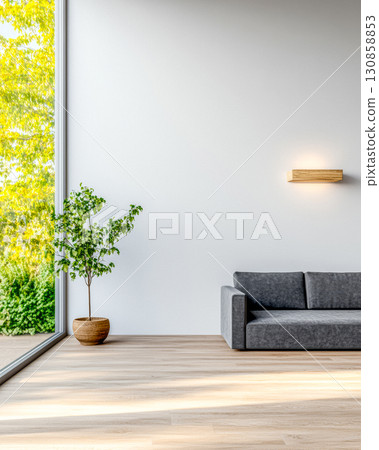Modern interior design featuring a cozy sofa and indoor plant in a sunlit space 130858853
