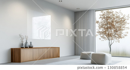 Modern living room with minimalist design featuring natural light and simple furniture in a peaceful setting 130858854