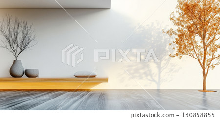 Modern interior design featuring minimalist furniture and a tree shadow in a bright space Modern interior design featuring minimalist furniture and a tree shadow in a bright space 130858855