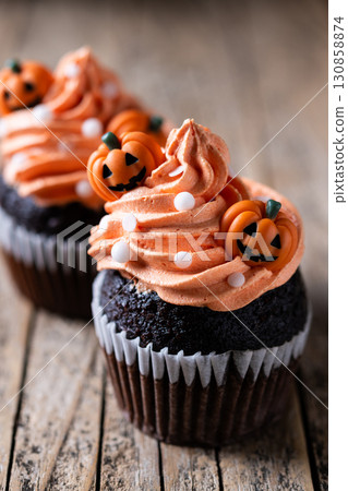 Halloween cupcakes with pumpkin decoration Halloween cupcakes with pumpkin decoration 130858874