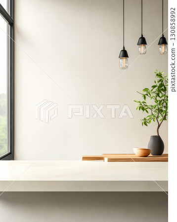 Modern interior design features a calm space with hanging lights, a tree, and a minimalist table 130858992