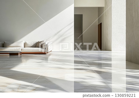 Modern interior design featuring a spacious living area with natural light highlighting minimalist architecture 130859221