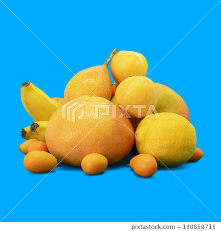 Composition of yellow citrus fruits on blue background 130859715