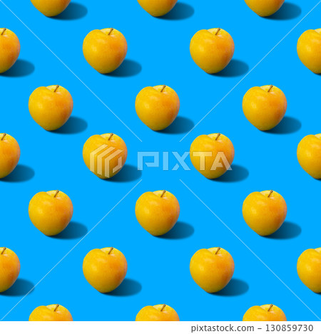Abstract yellow plums pattern on blue background Abstract yellow plums pattern on blue background 130859730