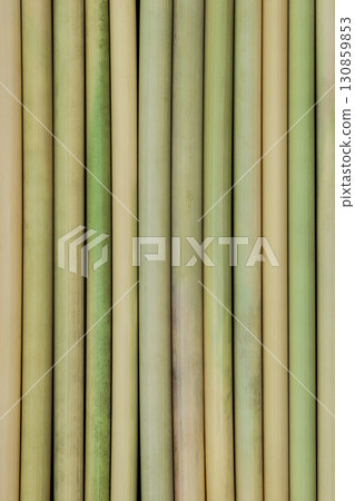 Background surface of bamboo sticks placed next to each other 130859853