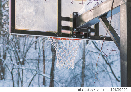 Basketball board covered with snow Basketball board covered with snow 130859901