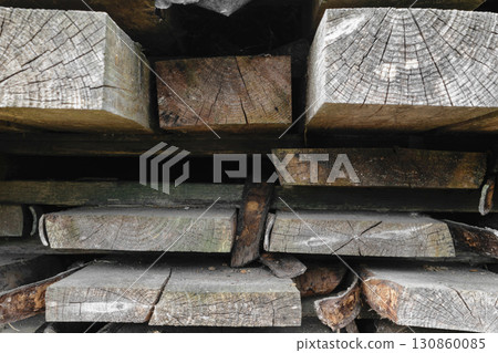 Stacks of old and grey wood boards background surface 130860085