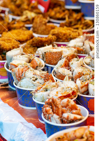 Fresh grilled crab slices in Thailand market Fresh grilled crab slices in Thailand market 130860159