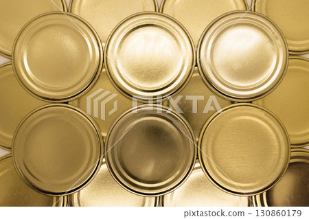 Golden jar lids background Golden jar lids background 130860179