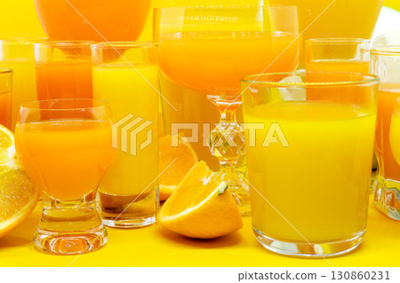 Juice in various shape glasses 130860231