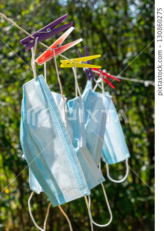 Used medicine masks hanging like laundry Used medicine masks hanging like laundry 130860275