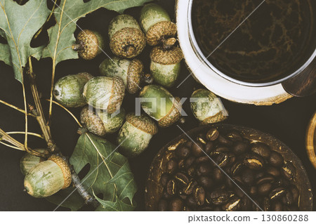 Oak tree acorns coffee background 130860288