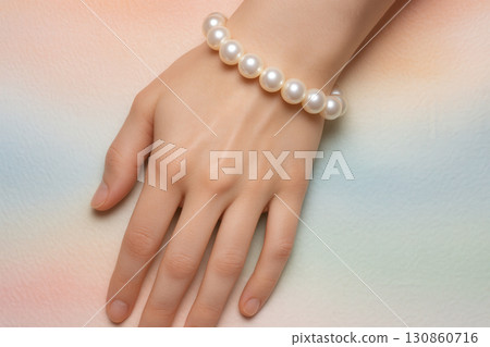 Elegant Pearl Bracelet On Hand Over Pastel Background 130860716