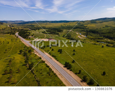 Scenic view of green fields and winding roads in Vladivostok, Russia 130861076