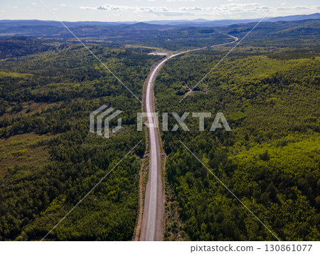 Scenic view of winding road through lush nature in Vladivostok, Russia 130861077