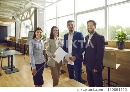 Diverse Team of Smiling Team in Group Portrait 130861533