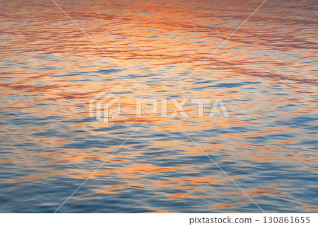 The orange water surface dyed by the sunset The orange water surface dyed by the sunset 130861655