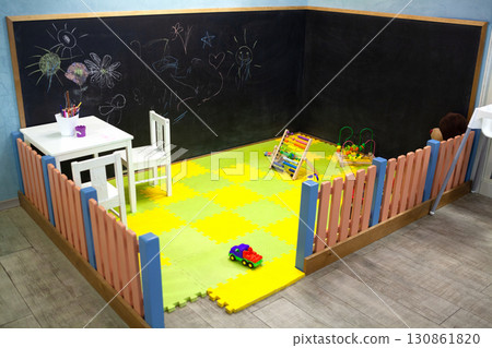 Playgrounds for kids in shopping mall 130861820