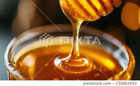 Traditional Dripper Producing Luminous Honey Drips 130862850