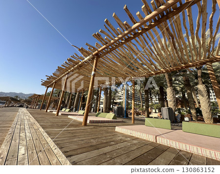 Well-equipped city beach on the Eilat embankment 130863152