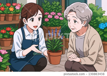 A female saleswoman introducing potted plants to an elderly customer at a flower shop 130863438