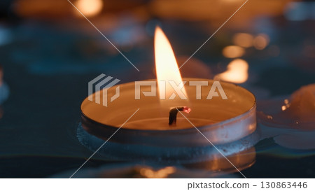 Candle floats in river for the religious festival of Diwali 130863446