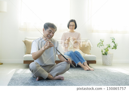 A couple enjoying hobbies A couple enjoying hobbies 130865757