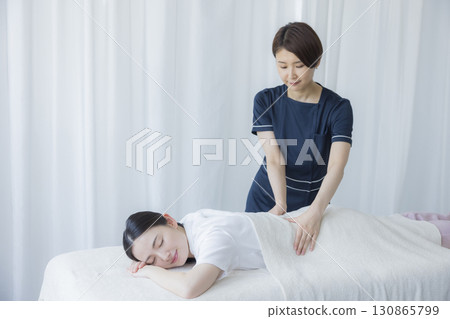 A woman receiving accommodation A woman receiving accommodation 130865799