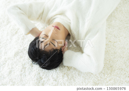 Young man lying down Young man lying down 130865976