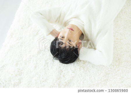 Young man lying down 130865980